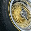 New Set (4) Gold And Chrome 15x7" 100 Spoke Standard Rear Wheel Drive Wire Wheels & Vogue 215-70-15 Whitewall Yellow Gold Stripe Tire set Complete Set of four - Image 7