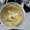 New 13x7" Deep Dish 24kt Gold and Chrome 100 Spoke Wire Spoke Wheels True Knockoff Lowrider Set (4) with 2 Wing Hardware - Image 4