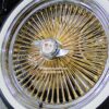 New Impala 18" Standard 24kt GOLD & Chrome 100 Spoke True knockoff Wire Wheels & Low Profile 215-40-18 Whitewall Tires Set of four (4) With Chevy Hardware - Image 3