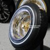 New 13x7" 24kt Triple Gold Chrome 100 Spoke Wire Spoke Wheels True Knockoff Lowrider Set (4) with 2 Wing Hardware & 155-80-13 whitewall Tire Package - Image 2