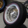 New 15x7" Cadillac 72 Spoke Chrome Cross Lace Wire Wheels & Vogue Whitewall / Red Stripe 215-70-15 Tires Set (4) Fit Rear Wheel Drive Deville Seville Brougham Fleetwood & More RWD Cars - Image 2