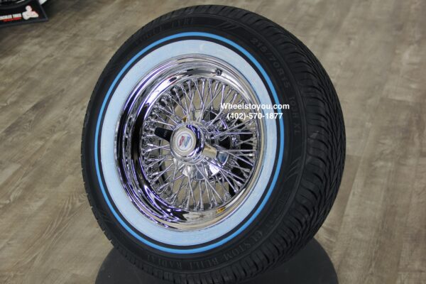 New Set (4) 15x7" Buick 72 Spoke Chrome Cross Lace Wire Wheels & Vogue Whitewall / Blue Stripe 215-70-15 Tires Set (4) Fit Rear Wheel Drive Cars Century, Electra, Estate Wagon, Invicta, Lesabre, Roadmaster, Riviera, Skylark, Wildcat, 225