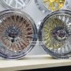 New Set (4) 18x9" Stagggered Genuine Dayton Stamped Serialized Deep Dish 100 Spoke Triple Cross Lace Stainless & Chrome Lowrider Knockoff Wire Wheels Set of four (4) with Hardware - Image 4